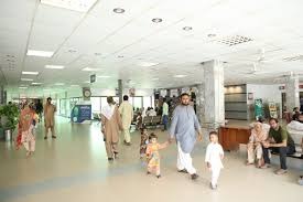 Female staff nurses providing patient care