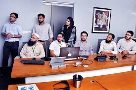 Assistant Manager working in a corporate office environment in Pakistan